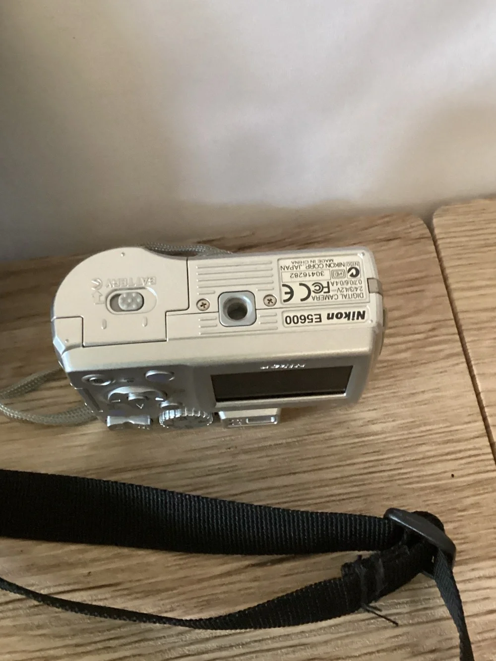 Nikon Silver Compact Digital Camera with Black Carrying Pouch